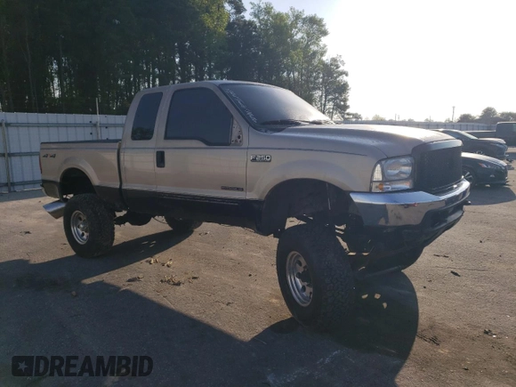 1999 Ford F-250 XL with VIN 1FTNX21F0XEE70963, listed as a Copart auction lot 52294955 with 218,969 mi miles and Salvage title. Bid and sale history available at DreamBid. Image 4.