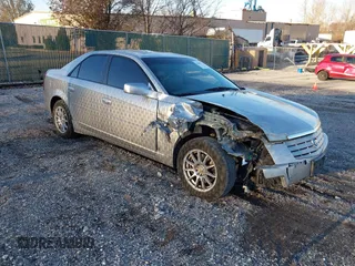 2007 Cadillac CTS z VIN 1G6DP577970105436, wystawiony jako IAAI lot #41093723 z przebiegiem 189 442 mil mil oraz . Historia ofert i sprzedaży dostępna na DreamBid. Obrazek 1.