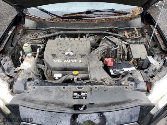 2010 Mitsubishi Outlander XLS with VIN JA4JT4AX4AZ009743, listed as a Copart auction lot 52824925 with 117,984 mi miles and Clean Title. Bid and sale history available at carsss.com. Image 12.