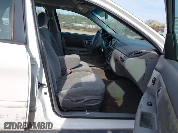 2003 Ford Taurus SE Standard with VIN 1FAFP53U73A107231, listed as a IAAI auction lot 41826418 with 123,774 mi miles. Bid and sale history available at carsss.com. Image 5.