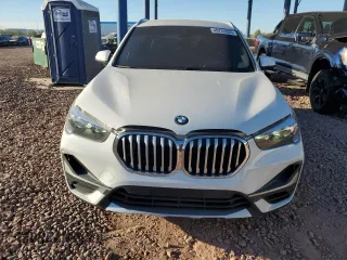 2021 BMW X1 xDrive28i with VIN WBXJG9C08M5U21413, listed as a Copart auction lot 49733935 with 44,220 mi miles and Salvage Title. Bid and sale history available at carsss.com. Image 5.