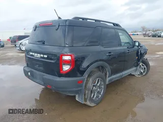 2021 Ford Bronco Sport Badlands z VIN 3FMCR9D96MRA42819, wystawiony jako IAAI lot #41000673 z przebiegiem 58 831 mil mil oraz . Historia ofert i sprzedaży dostępna na DreamBid. Obrazek 4.