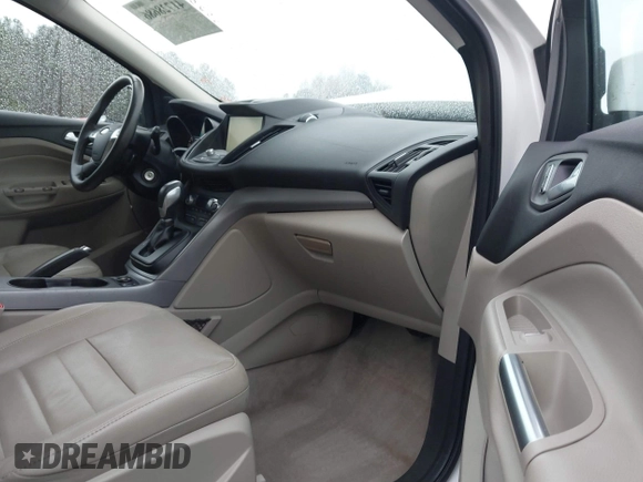 2014 Ford Escape SE with VIN 1FMCU0GX6EUD43105, listed as a IAAI auction lot 41728686 with 95,729 mi miles. Bid and sale history available at carsss.com. Image 5.