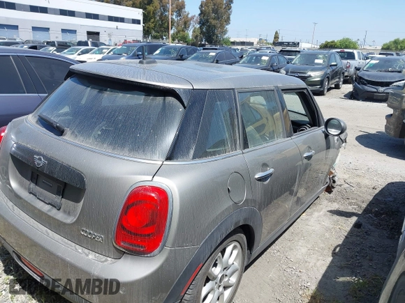 2019 MINI Hardtop 4 Door Cooper with VIN WMWXU1C59K2L24715, listed as a IAAI auction lot 41398540 with 6,052 mi miles and . Bid and sale history available at DreamBid. Image 4.
