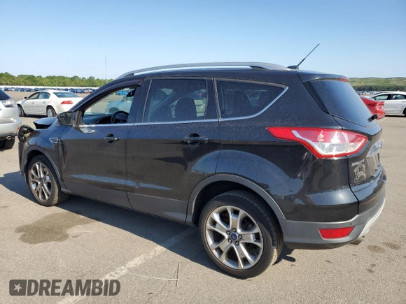 2015 Ford Escape Titanium with VIN 1FMCU0J95FUB59026, listed as a Copart auction lot 65047545 with 84,259 mi miles and Salvage title. Bid and sale history available at DreamBid. Image 2.