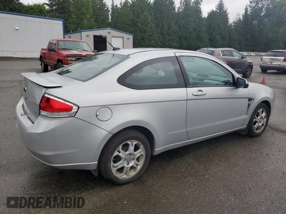 2008 Ford Focus SE z VIN 1FAHP33NX8W147139, wystawiony jako Copart lot #57520415 z przebiegiem 151 852 mil mil oraz Szkoda całkowita • Salvage title. Historia ofert i sprzedaży dostępna na DreamBid. Obrazek 3.