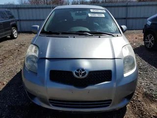 2007 Toyota Yaris with VIN JTDJT923975057611, listed as a Copart auction lot 50801955 with 106,474 mi miles and Clean Title. Bid and sale history available at carsss.com. Image 5.