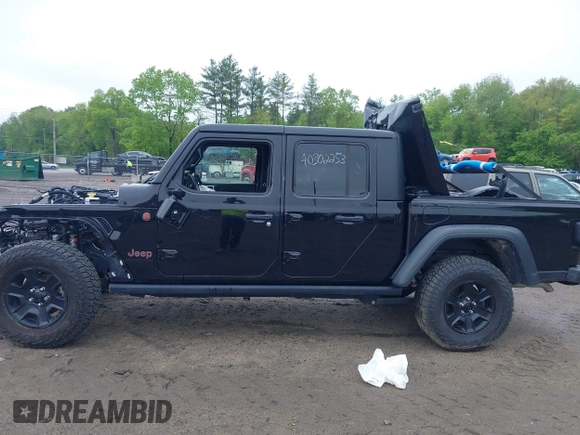 2021 Jeep Gladiator Mojave z VIN 1C6JJTEG9ML605638, wystawiony jako IAAI lot #40302253 z przebiegiem 32 019 mil mil oraz . Historia ofert i sprzedaży dostępna na DreamBid. Obrazek 14.