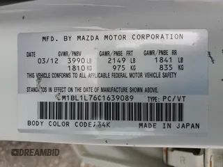 2012 Mazda 3 i Touring z VIN JM1BL1L76C1639089, wystawiony jako Copart lot #59891555 z przebiegiem 132 152 mil mil oraz Czysty tytuł • Clean title. Historia ofert i sprzedaży dostępna na DreamBid. Obrazek 12.