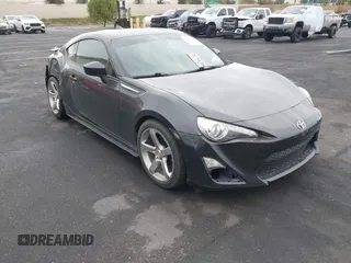 2014 Scion FR-S z VIN JF1ZNAA1XE8707577, wystawiony jako IAAI lot #42054339 z przebiegiem 95 241 mil mil oraz . Historia ofert i sprzedaży dostępna na DreamBid. Obrazek 1.