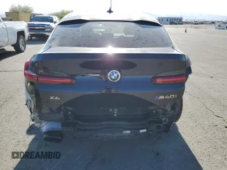 2021 BMW X4 M40i with VIN 5UX2V5C06M9E04443, listed as a Copart auction lot 72061194 with 71,637 mi miles and Salvage title. Bid and sale history available at DreamBid. Image 6.