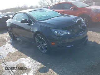 2016 Buick Cascada Premium with VIN W04WT3N53GG100841, listed as a IAAI auction lot 42050383 with 116,900 mi miles and . Bid and sale history available at DreamBid. Image 1.