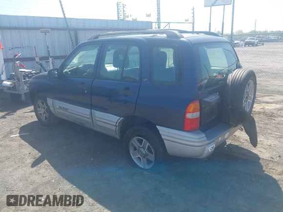 2002 Chevrolet Tracker LT z VIN 2CNBE634426952677, wystawiony jako IAAI lot #42009744 z przebiegiem 243 692 mil mil oraz . Historia ofert i sprzedaży dostępna na DreamBid. Obrazek 3.