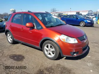 2009 Suzuki SX4 Man Touring Pkg AWD with VIN JS2YB417496201691, listed as a IAAI auction lot 41741746 with 172,369 mi miles. Bid and sale history available at carsss.com. Image 1.
