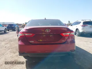 2019 Toyota Camry LE with VIN 4T1B11HK4KU725075, listed as a IAAI auction lot 41781275 with 156,856 mi miles and . Bid and sale history available at DreamBid. Image 16.