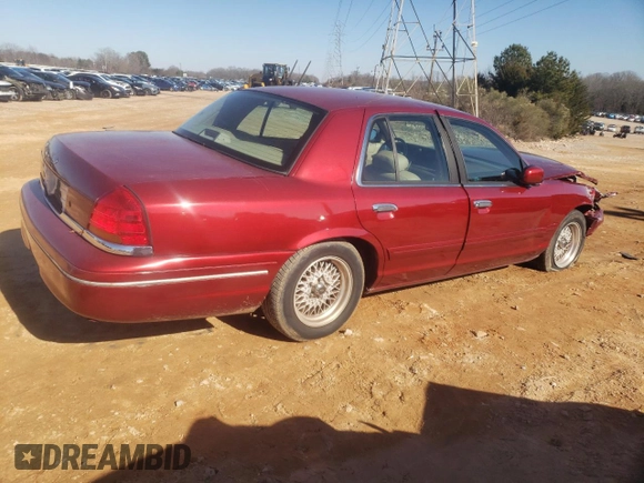 1998 Ford Crown Victoria LX с VIN 2FAFP74W3WX138757, выставлен на аукционе Copart как лот 87867945 с пробегом 148 827 миль миль и Списание • Salvage title. История ставок и продаж доступна на DreamBid. Изображение 3.
