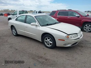 2001 Oldsmobile Aurora z VIN 1G3GR64H514231672, wystawiony jako IAAI lot #41872542 z przebiegiem 167 271 mil mil oraz . Historia ofert i sprzedaży dostępna na DreamBid. Obrazek 1.