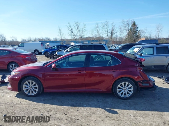 2019 Toyota Camry LE with VIN 4T1B11HK1KU233345, listed as a IAAI auction lot 41971136 with 51,499 mi miles and . Bid and sale history available at DreamBid. Image 15.