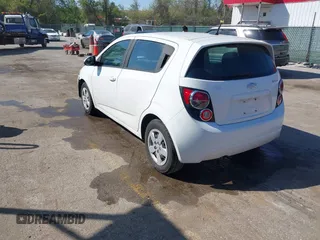 2014 Chevrolet Sonic LS with VIN 1G1JA6SH3E4196824, listed as a IAAI auction lot 42099058 with 66,584 mi miles and . Bid and sale history available at DreamBid. Image 3.
