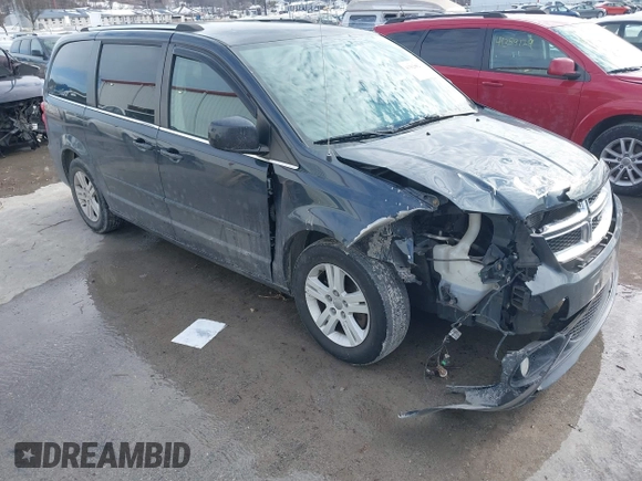 2013 Dodge Grand Caravan Crew with VIN 2C4RDGDG9DR740086, listed as a IAAI auction lot 41362852 with 145,881 mi miles and . Bid and sale history available at DreamBid. Image 1.