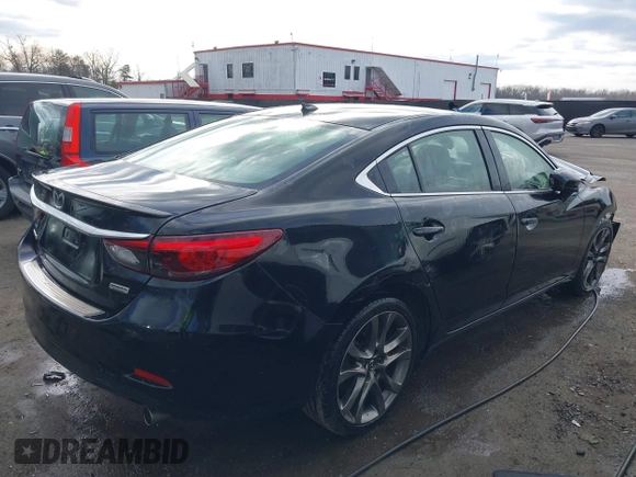 2016 Mazda 6 i Grand Touring with VIN JM1GJ1W54G1454115, listed as a IAAI auction lot 41203298 with 104,632 mi miles and . Bid and sale history available at DreamBid. Image 4.