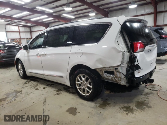 2020 Chrysler Pacifica Touring L with VIN 2C4RC1BGXLR128514, listed as a Copart auction lot 57333635 with 71,109 mi miles and Salvage title. Bid and sale history available at DreamBid. Image 2.