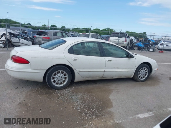 1999 Chrysler Concorde LX z VIN 2C3HD46RXXH620742, wystawiony jako IAAI lot #42292747 z przebiegiem Nie podano mil oraz . Historia ofert i sprzedaży dostępna na DreamBid. Obrazek 13.