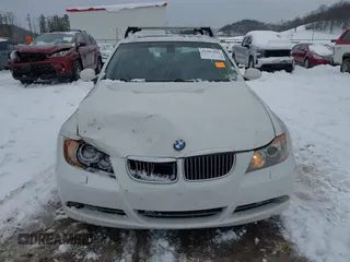 2006 BMW 3 Series 330xi with VIN WBAVD33556KL52150, listed as a IAAI auction lot 41307691 with 168,546 mi miles. Bid and sale history available at carsss.com. Image 12.