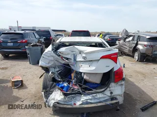 2019 Toyota Corolla L with VIN 5YFBURHE8KP901272, listed as a IAAI auction lot 42031180 with 117,932 mi miles and . Bid and sale history available at DreamBid. Image 16.