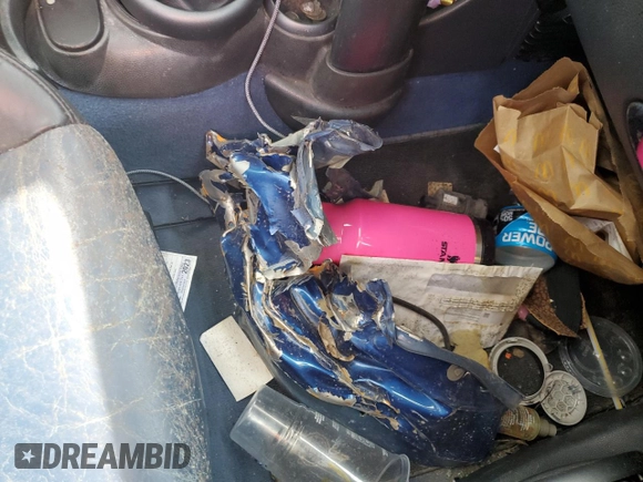 2006 MINI Hardtop with VIN WMWRC33566TK15023, listed as a Copart auction lot 76392014 with Not provided miles and Salvage title. Bid and sale history available at DreamBid. Image 13.