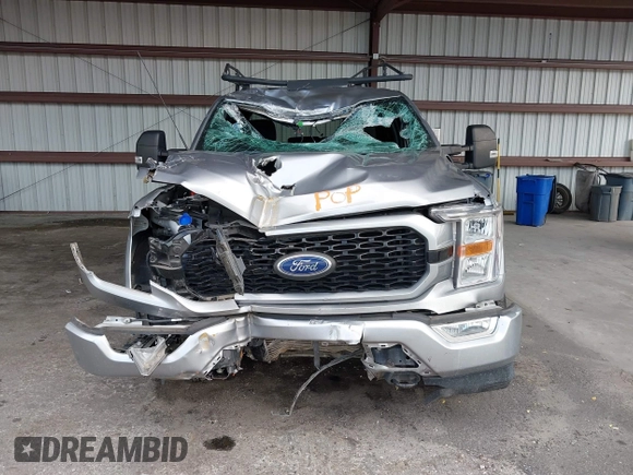 2021 Ford F-150 XL z VIN 1FTFW1E89MFC21046, wystawiony jako IAAI lot #42668472 z przebiegiem 83 083 mil mil oraz . Historia ofert i sprzedaży dostępna na DreamBid. Obrazek 6.