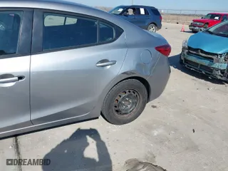 2014 Mazda Mazda3 i Sport with VIN JM1BM1U79E1141385, listed as a IAAI auction lot 41327939 with 132,975 mi miles. Bid and sale history available at carsss.com. Image 6.