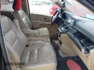 2007 Honda Odyssey Touring z VIN 5FNRL38827B059573, wystawiony jako IAAI lot #42261125 z przebiegiem 214 954 mil mil oraz . Historia ofert i sprzedaży dostępna na DreamBid. Obrazek 5.