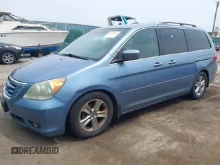 2010 Honda Odyssey Touring with VIN 5FNRL3H93AB008129, listed as a IAAI auction lot 42115112 with 260,075 mi miles. Bid and sale history available at carsss.com. Image 2.