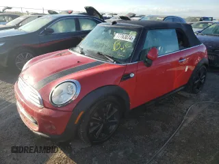 2014 MINI Convertible with VIN WMWZN3C5XET266498, listed as a Copart auction lot 77763074 with 76,680 mi miles and Non Repairable. Bid and sale history available at DreamBid. Image 1.