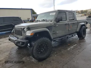 2021 Jeep Gladiator Sport S z VIN 1C6JJTAG1ML562354, wystawiony jako Copart lot #54850185 z przebiegiem 67 473 mil mil oraz Nie do naprawy. Historia ofert i sprzedaży dostępna na DreamBid. Obrazek 1.