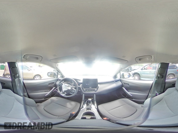 2023 Toyota Corolla Cross LE with VIN 7MUCAAAG2PV053730, listed as a Copart auction lot 54825035 with 33,313 mi miles and Salvage title. Bid and sale history available at DreamBid. Image 16.