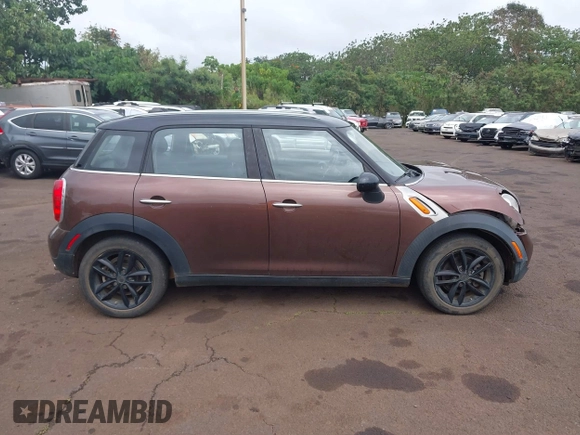 2014 MINI Countryman with VIN WMWZB3C51EWR36737, listed as a IAAI auction lot 41741248 with 69,717 mi miles and . Bid and sale history available at DreamBid. Image 14.