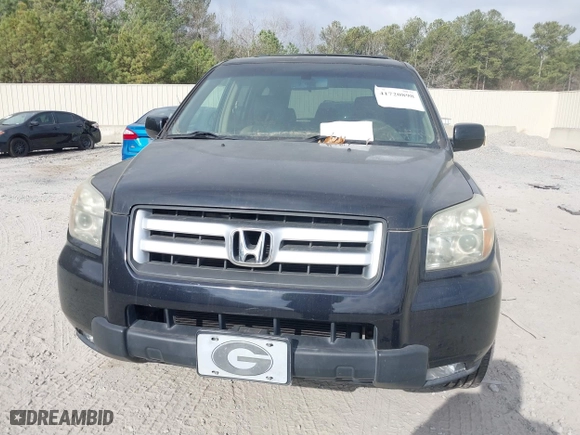 2006 Honda Pilot EX-L with VIN 5FNYF28576B030507, listed as a IAAI auction lot 41720898 with 201,518 mi miles. Bid and sale history available at carsss.com. Image 6.