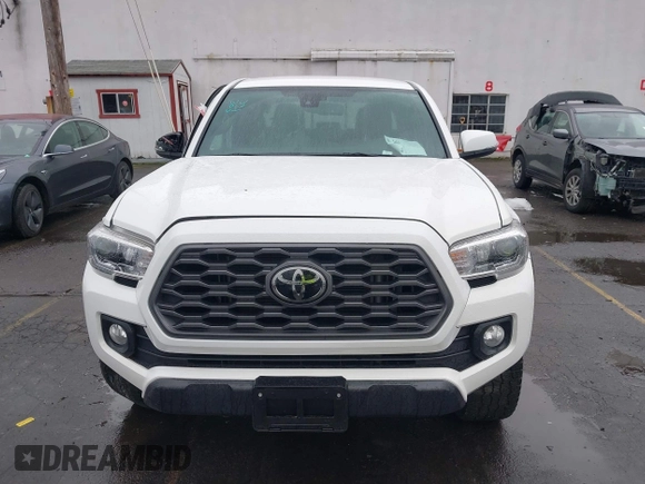 2021 Toyota Tacoma 4WD SR5 with VIN 3TMDZ5BN6MM108851, listed as a IAAI auction lot 41513057 with 25,261 mi miles. Bid and sale history available at carsss.com. Image 12.