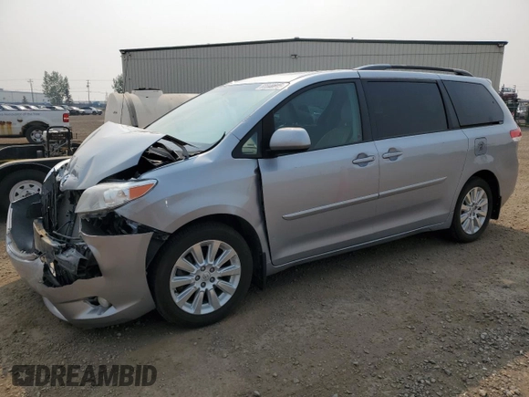 2014 Toyota Sienna Limited with VIN 5TDDK3DC4ES073698, listed as a Copart auction lot 60848915 with 418,121 mi miles and Salvage title. Bid and sale history available at DreamBid. Image 1.