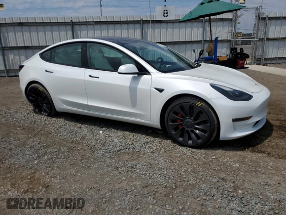 2023 Tesla Model 3 Performance with VIN 5YJ3E1EC5PF487845, listed as a Copart auction lot 62686164 with 4,938 mi miles and Salvage Title. Bid and sale history available at carsss.com. Image 4.