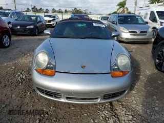 2001 Porsche Boxster S с VIN WP0CB29831S660325, выставлен на аукционе Copart как лот 79606054 с пробегом Не указан миль и На запчасти • Non repairable. История ставок и продаж доступна на DreamBid. Изображение 5.
