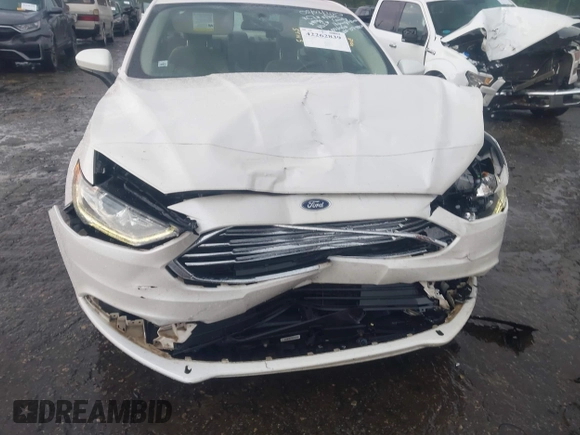 2018 Ford Fusion SE z VIN 3FA6P0H75JR159448, wystawiony jako IAAI lot #42262839 z przebiegiem 144 353 mil mil oraz . Historia ofert i sprzedaży dostępna na DreamBid. Obrazek 6.
