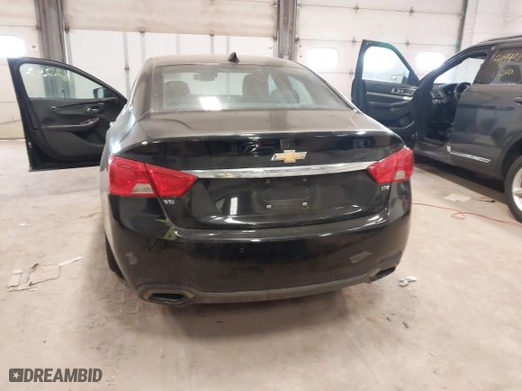 2015 Chevrolet Impala LTZ with VIN 2G1165S38F9145916, listed as a IAAI auction lot 41982242 with 303,316 mi miles. Bid and sale history available at carsss.com. Image 16.