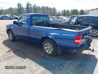 2009 Ford Ranger XL with VIN 1FTYR10D59PA06186, listed as a IAAI auction lot 42103327 with 124,558 mi miles. Bid and sale history available at carsss.com. Image 3.