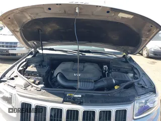 2014 Jeep Grand Cherokee Limited with VIN 1C4RJFBG7EC395138, listed as a IAAI auction lot 42117356 with 202,995 mi miles. Bid and sale history available at carsss.com. Image 10.