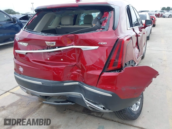 2020 Cadillac XT5 Premium Luxury FWD z VIN 1GYKNCRS8LZ228516, wystawiony jako IAAI lot #42409513 z przebiegiem 54 765 mil mil oraz . Historia ofert i sprzedaży dostępna na DreamBid. Obrazek 17.