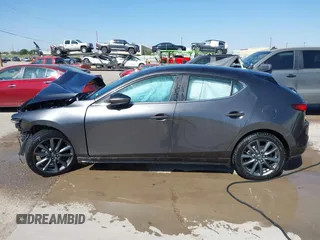 2023 Mazda 3 S Preferred with VIN JM1BPALM6P1610353, listed as a IAAI auction lot 42144106 with 55,131 mi miles and . Bid and sale history available at DreamBid. Image 14.