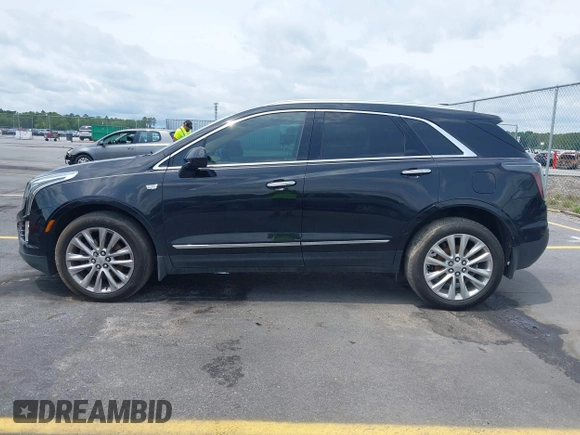 2017 Cadillac XT5 Platinum AWD z VIN 1GYKNFRS9HZ125677, wystawiony jako IAAI lot #42366784 z przebiegiem 152 116 mil mil oraz . Historia ofert i sprzedaży dostępna na DreamBid. Obrazek 15.